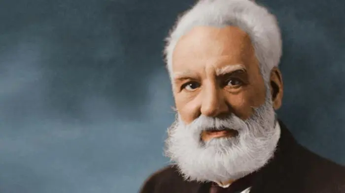 Portrait of a distinguished elderly man with white hair and beard.