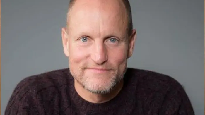 Portrait of a middle-aged man with a friendly expression and a close-cropped beard.