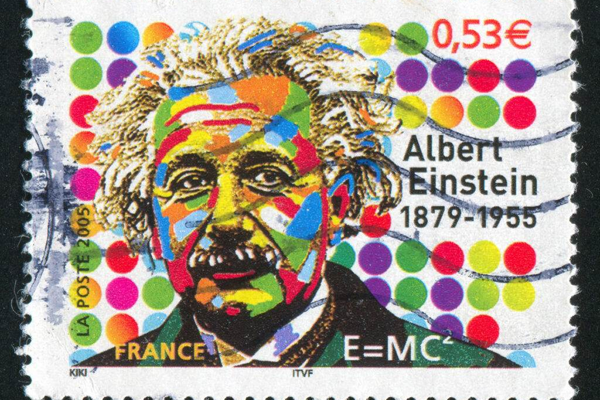 Colorful Albert Einstein portrait on a French stamp.